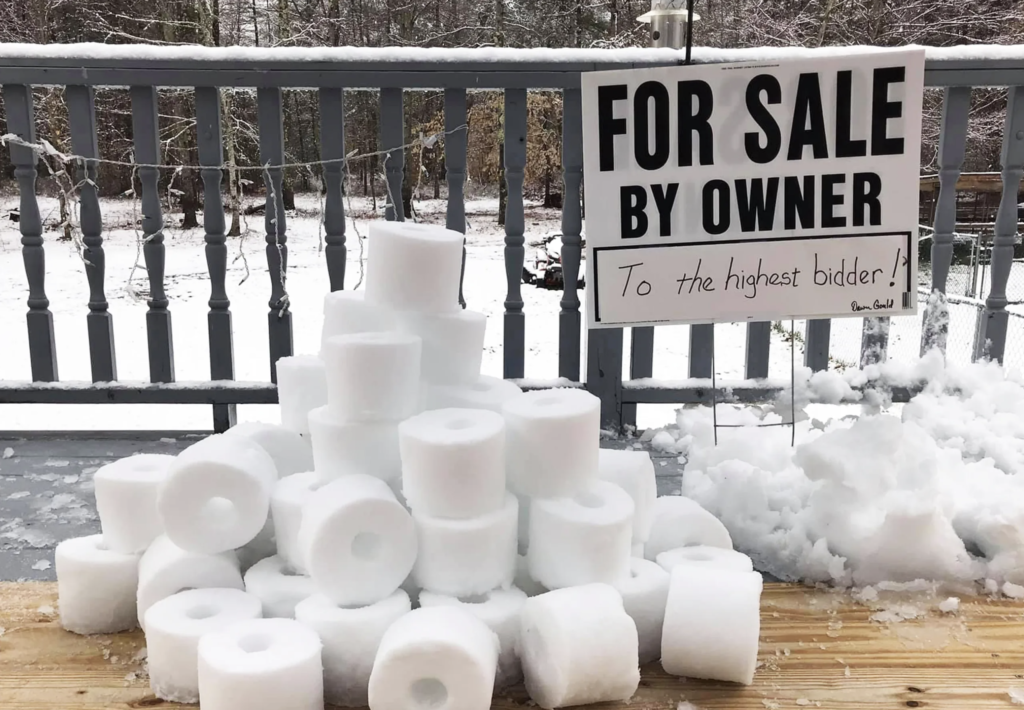 Snow sculpture of a mount of toilet paper rolls